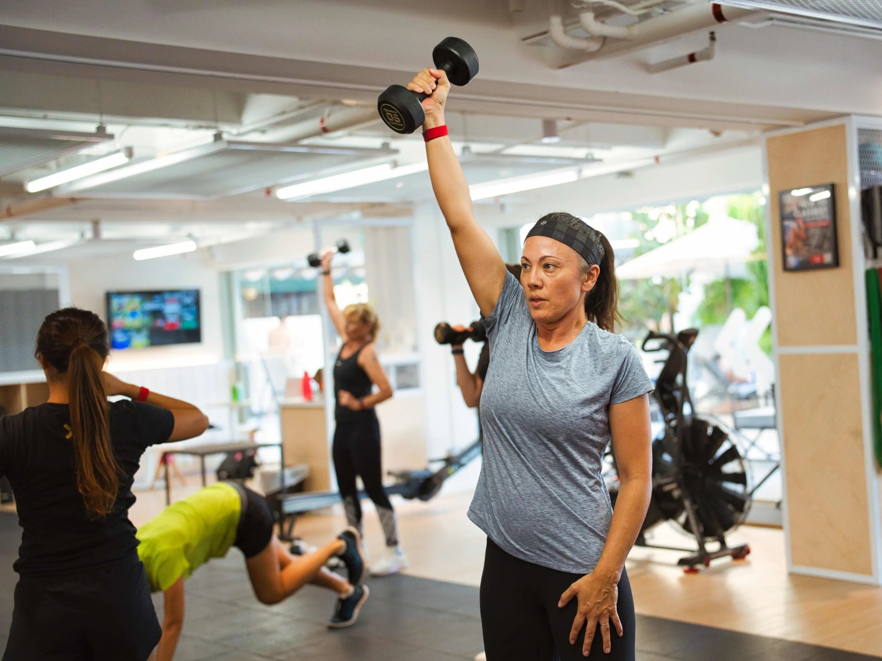 Group class workout in the gym Female